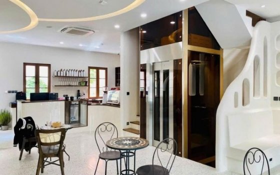 Báo giá thang máy kính gia đình mới nhất