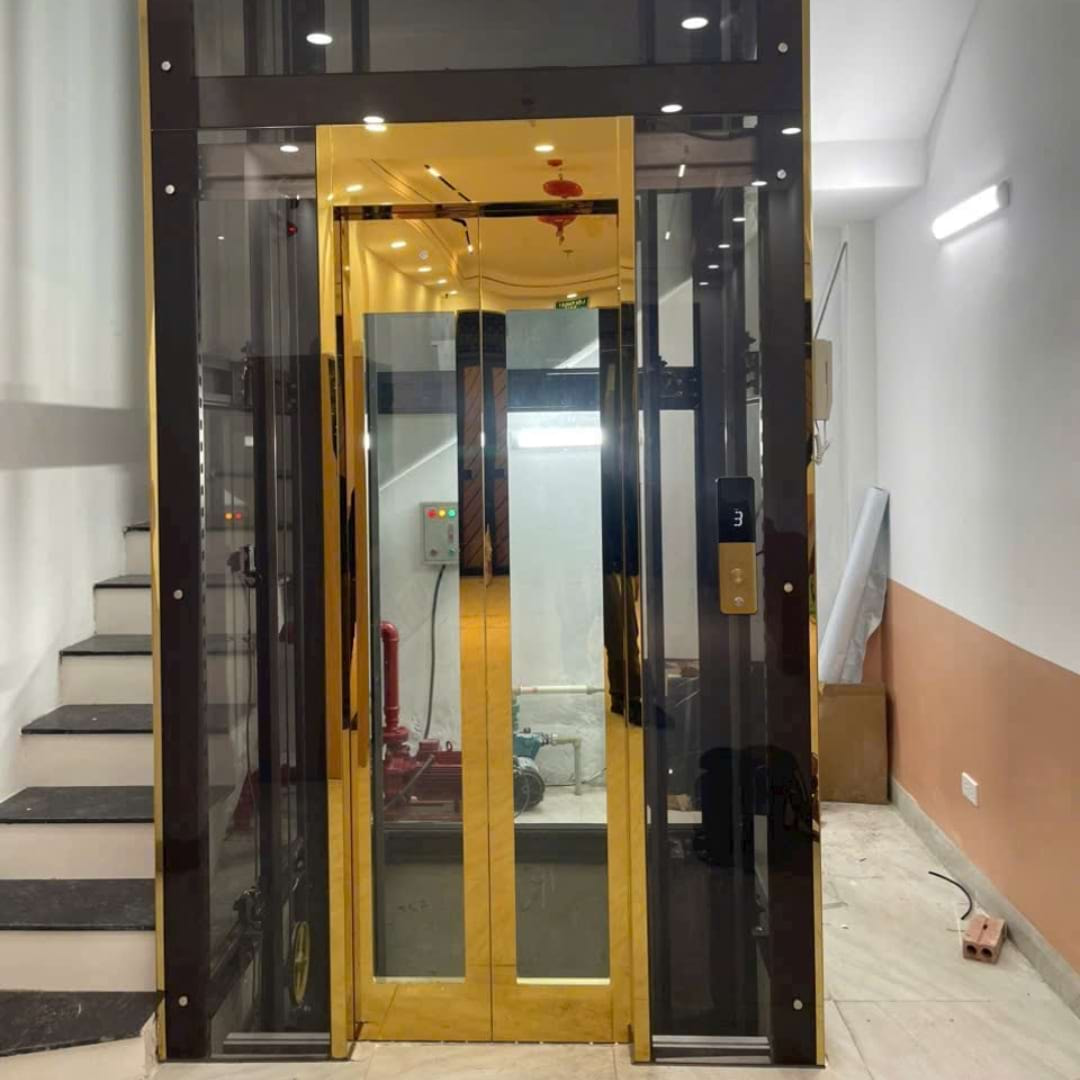 Thang máy kính 350kg